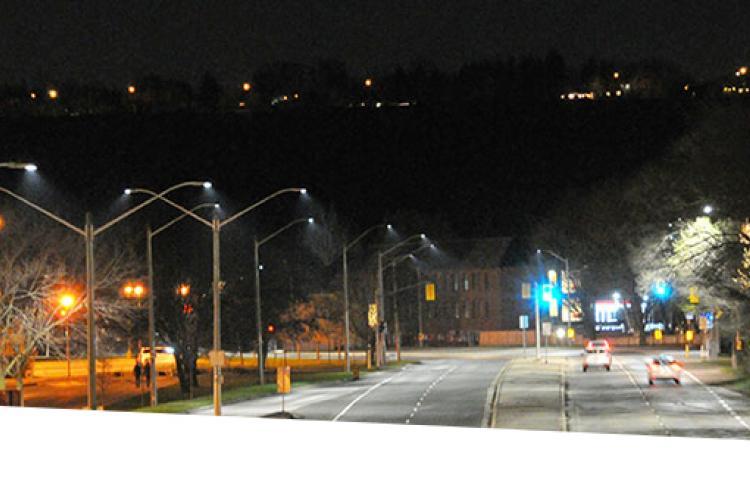Roadway at night with street lights