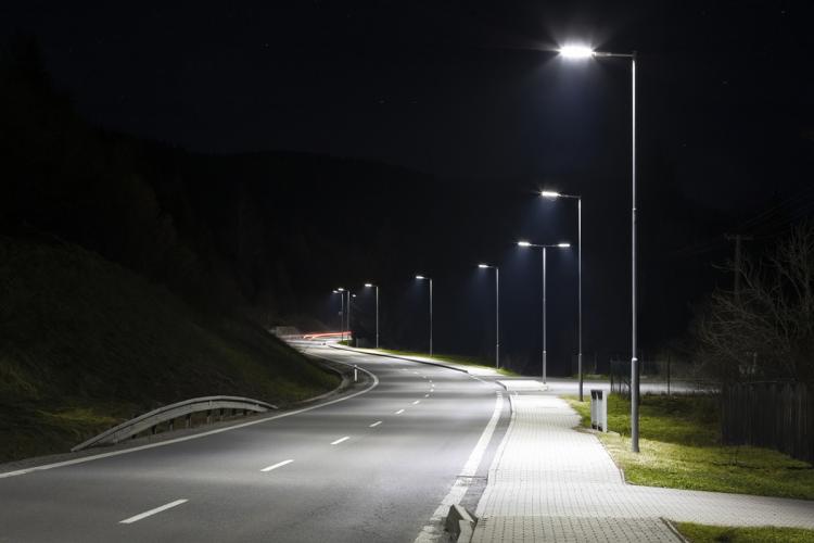 A road lit by LED streetlights at night