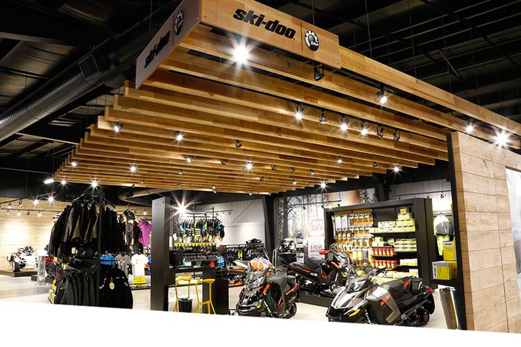 Snowmobile showroom with clothing racks 