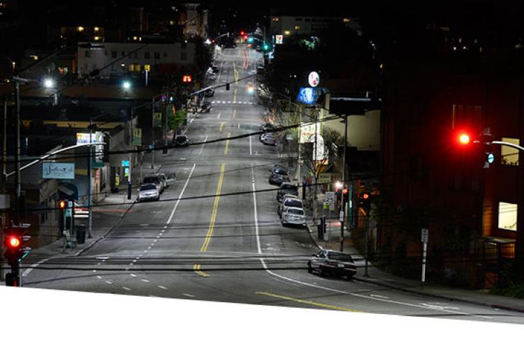  Roadway with traffic lights at night 